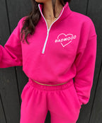 "HARD TO BREAK" QUARTER ZIP CROP in FUSCHIA