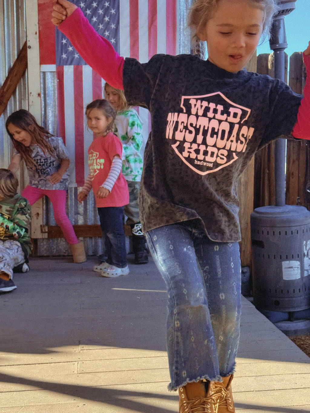 "WILD WEST COAST KIDS" Kids' Tee in BLACK LEOPARD